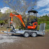 Kubota digger and trailer — view 3