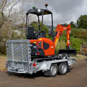 Kubota digger and trailer — view 1